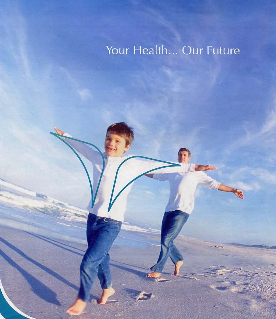 A full page: the boy on the beach in colour, with the logo.