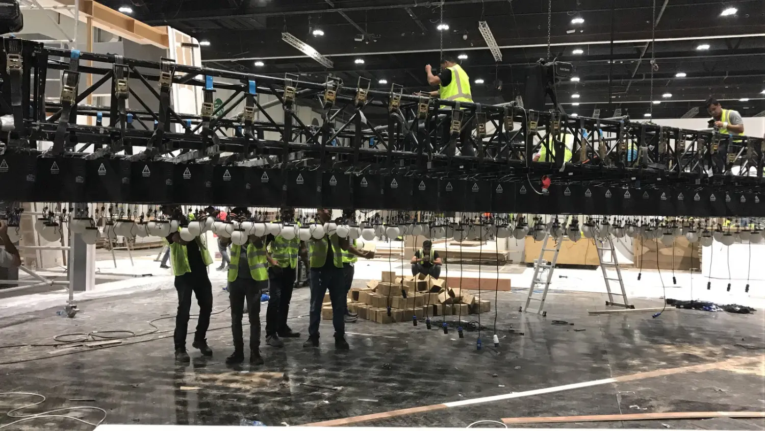The truss with the spheres hung on it, before it was lifted