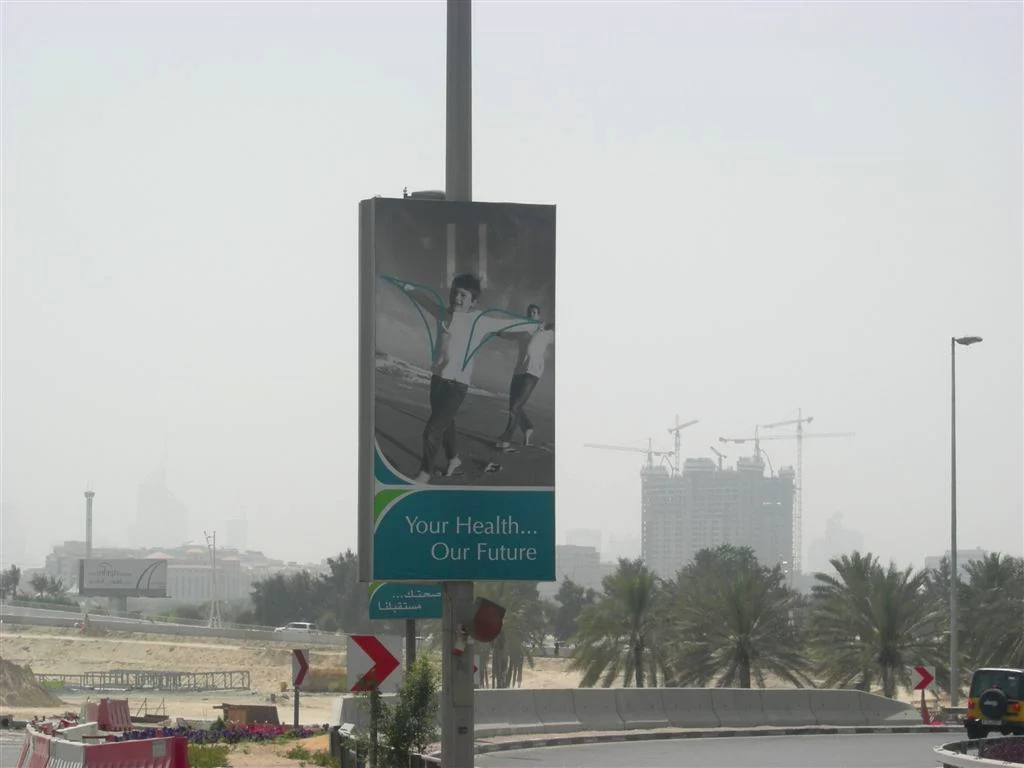 Al Garhoud Road, Dubai, 12 April 2008: a lamp-post light box with the teaser of the two boys, in black and white, no logo